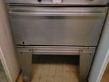 an image of a stove with pots on top of it