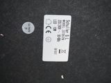 a picture of a close up of a label on a black surface