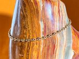 a close up of a necklace on a mannequin