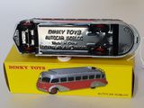 a toy bus that is sitting on top of a box