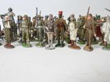a lot of figurines that are on a table