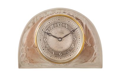 a clock that is sitting on top of a table