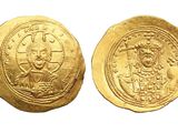a gold coin with an image of a man on it