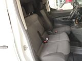 the back seats of a car with a seat belt in the back