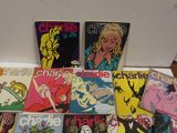 a lot of comic books that are on the table