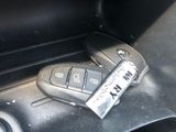 a car key and remote control in a car