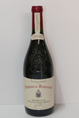 a bottle of wine that is sitting on a table