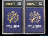 two one piece card game cards in a plastic case