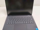 a close up of a laptop with a keyboard on a table