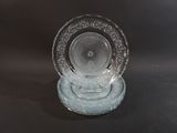 a glass plate on a stand on a table