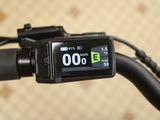 a close up view of a bike ' s speedometer on the handlebar