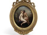 une image représentant un tableau de deux nus dans un cadre doré