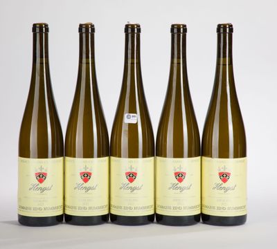 six bottles of wine are lined up in a row
