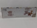 packaging for a teddy bear baby toy box with a teddy bear hanging from it ' s side