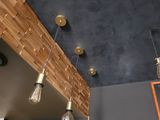 several lights hanging from the ceiling in a room
