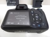 a digital camera that is sitting on a table