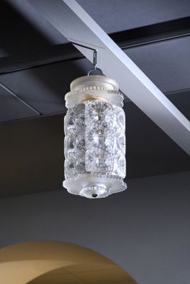 a light that is hanging from the ceiling in the room