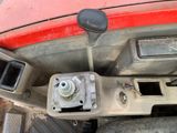 a close up of a car dashboard with a steering control
