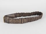a close up of a belt with a metal buckle on it