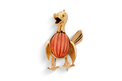 une image représentant une broche en forme d'oiseau sur fond blanc