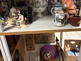 a shelf that has a lot of items on it
