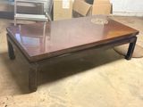 a coffee table that is sitting in the middle of a room