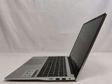 an open laptop computer sitting on top of a white table
