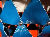 a close up of a mannequin made of blue leather