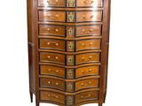 an image of a wooden chest of drawers with a marble top