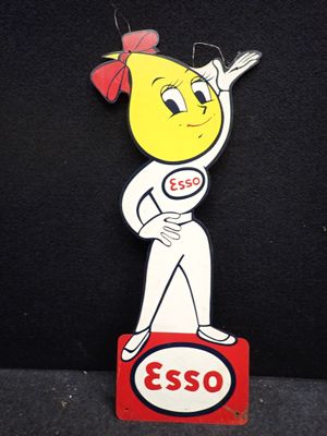un panneau sur lequel est inscrit « Esso » et qui représente un personnage de dessin animé
