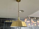 a light that is hanging from the ceiling in a restaurant