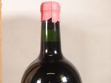 a bottle of wine that is sitting on a table