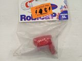 a small red object in a plastic bag on a table