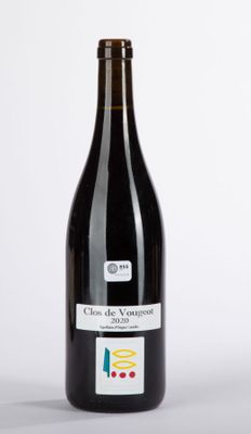 a bottle of wine that is sitting on a table