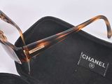 a pair of glasses in a case on a table