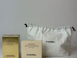 chanel cosmetic bag with two boxes and a small pouch