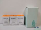 three boxes of dessanage on a table next to a box