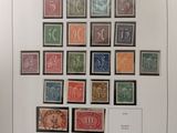 an image of a picture of a bunch of stamps on a table