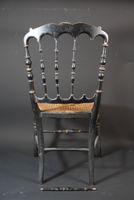 Suite de trois chaises en bois peint noir à dossier ajouré. (photo 3)
