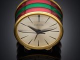 a clock that is sitting on top of a table