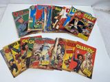 several comics are lined up in a row on a white surface