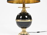 an image of a black and gold table lamp with a black shade