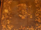 pair of antique wooden side tables decorated with flowers and birds