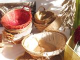 many baskets that are sitting on a table