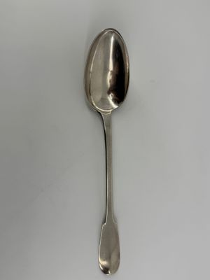 a spoon that is sitting on a table