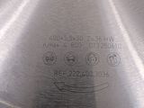 a close up of a metal pan with a label on it