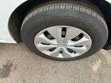 a close up of a tire on a car ' s rim