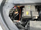 a car engine with a bunch of batteries in it