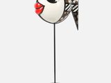 an image of a fish sculpture on a black stand