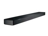a close up of a black sound bar on a white background